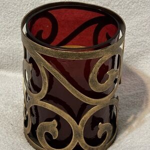 Decorative Red Glass Candle Holder with Gold-Tone Scrollwork